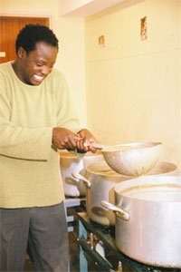 Alex pouring soup